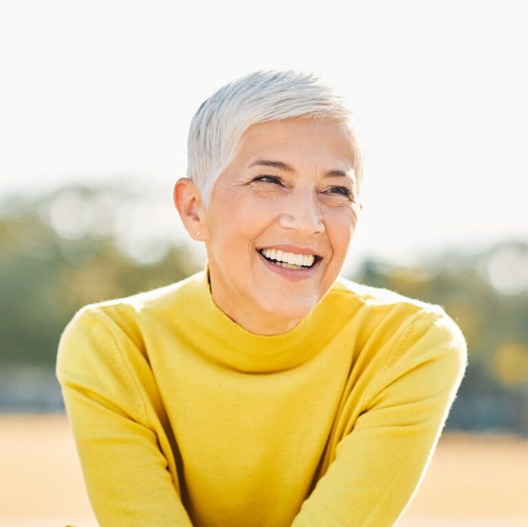 Everlan of Louisville | Smiling senior woman sitting outside